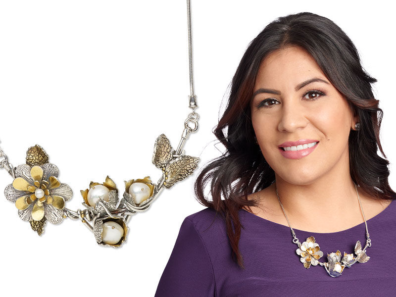 Model wearing a metal clay necklace