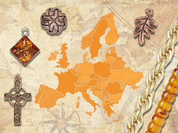 Neutral background shows a pale orange map of Europe. On top of the background on the left are five charms: a cross, a gold crystal diamond shape, a leaf, a Celtic knot and a Tree of Life. On top of the background on the right are three chains: silver chain, brown round gemstones, and gold-hued rocaille gemstones.