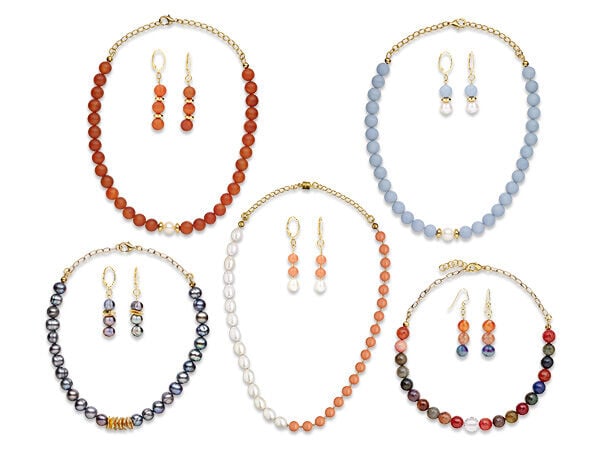 Five beaded necklaces with chain at the back; each necklace has matching earrings with three beads hanging vertically on each earring