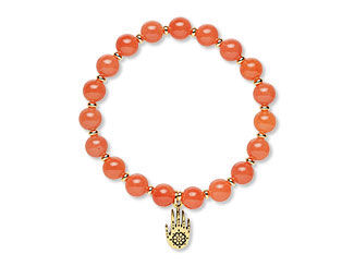 An image of a stretch bracelet made with orange malaysia "jade"