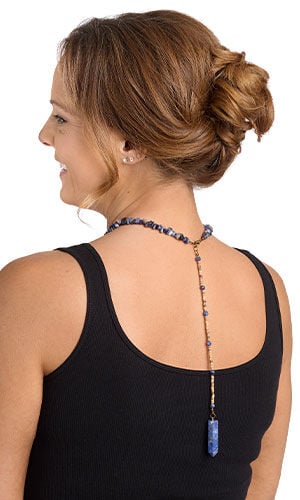 Design Idea R G 2 5 Short necklace composed of blue chip beads with two blue point pendants in the front and a 10-inch beaded strand ending with a larger blue point pendant in the back.