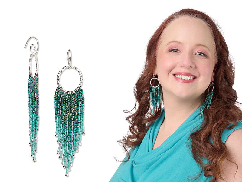 Model wearing earrings with seed beads
