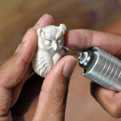 Bone carving of an owl