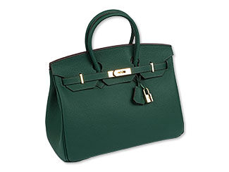 Forest green rectangular leather purse wider than it is tall. It has a leather handle at the top of each side. A strip of leather with golden components is horizontally placed on the bag near the top. A golden padlock hangs from one handle.