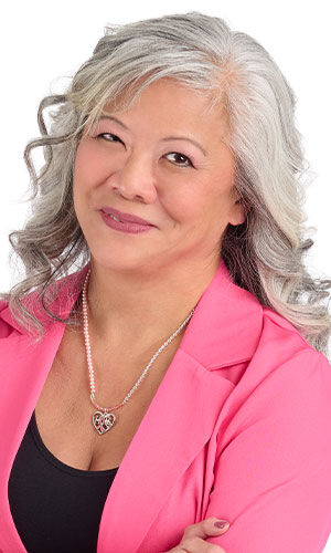 Design Idea R J 2 B on a smiling woman in pink