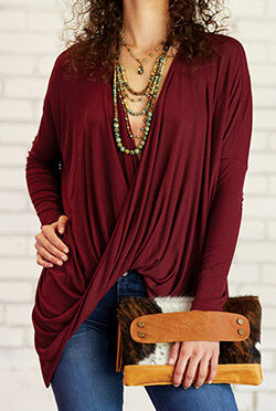 woman modeling necklaces
