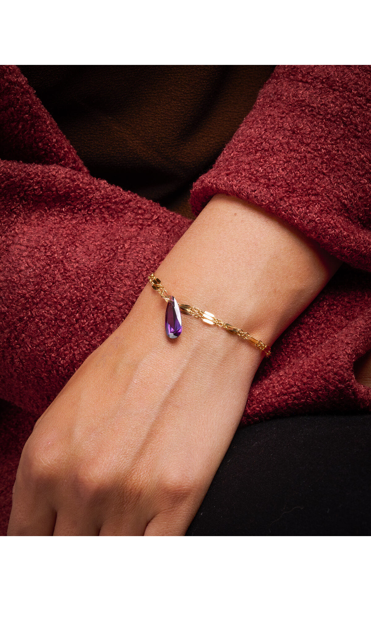 model's wrist showing Design Idea R C 3 8 bracelet with gold-filled chain and cubic zirconia