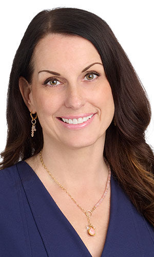 Model in dark blue blouse wearing design idea R N 2 H