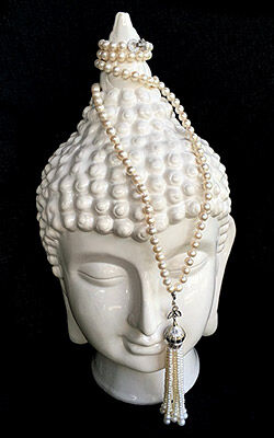 Necklace on a ceramic head