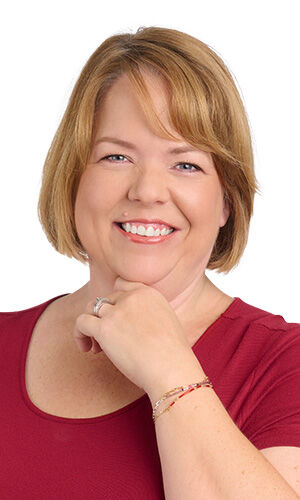 Model wearing a red shirt with design idea rm29 on wrist