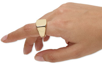 Hand wearing the ring