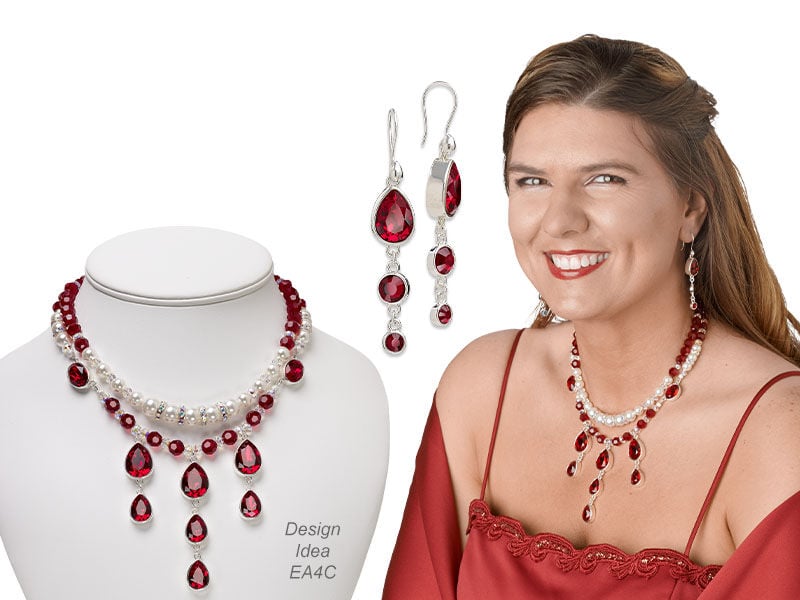 Model wearing a necklace made red fancy stones