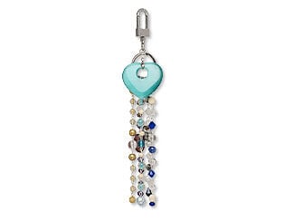 Design Idea S G 2 J - Purse charm hangs from a silvery split ring, with a shiny blue heart component and five strands of sparkling blue, black, clear and golden beads.
