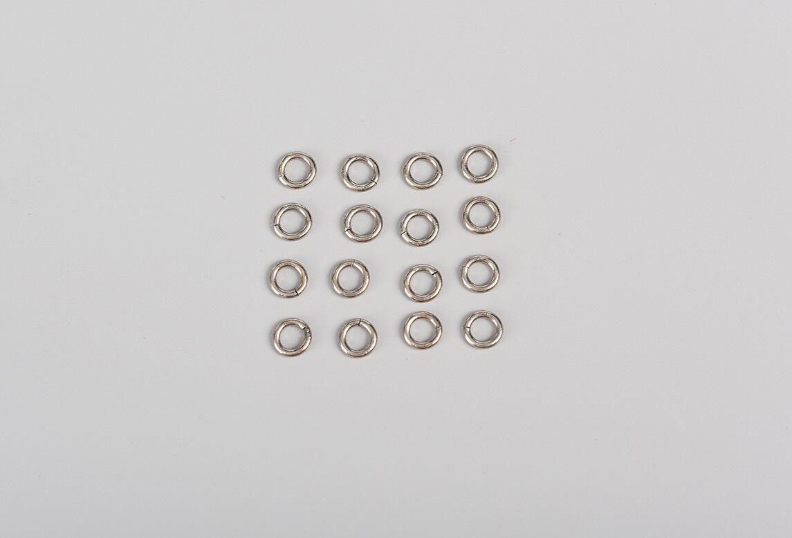 Sixteen silver jump rings