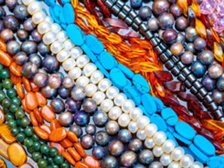 Rows of multicolored beads and pearls