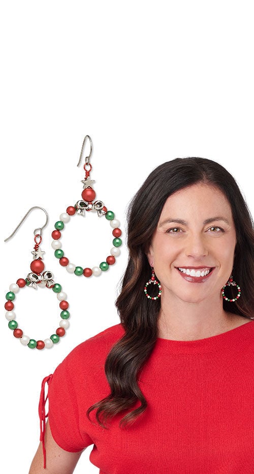 Model wearing earrings made with crystal passions pearls