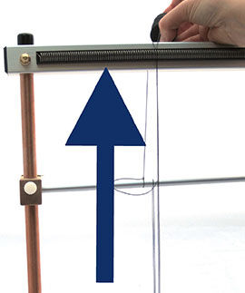 Step 11 - Back up to the loom's warping coil