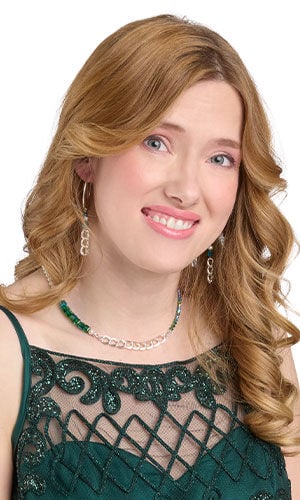 Modeled with Design Idea S B 2 P &ndash; Necklace and earring set features large dark green crystal beads&mdash;bicone on one side and cubes on the other&mdash;and large silver chain.