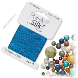 Blue Silk Thread next to mixed beads