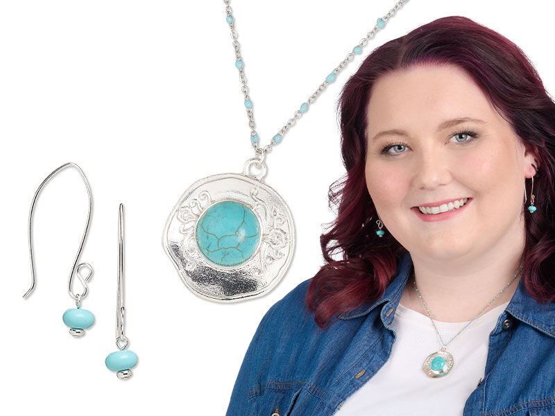 Model wearing a western themed necklace and earrings