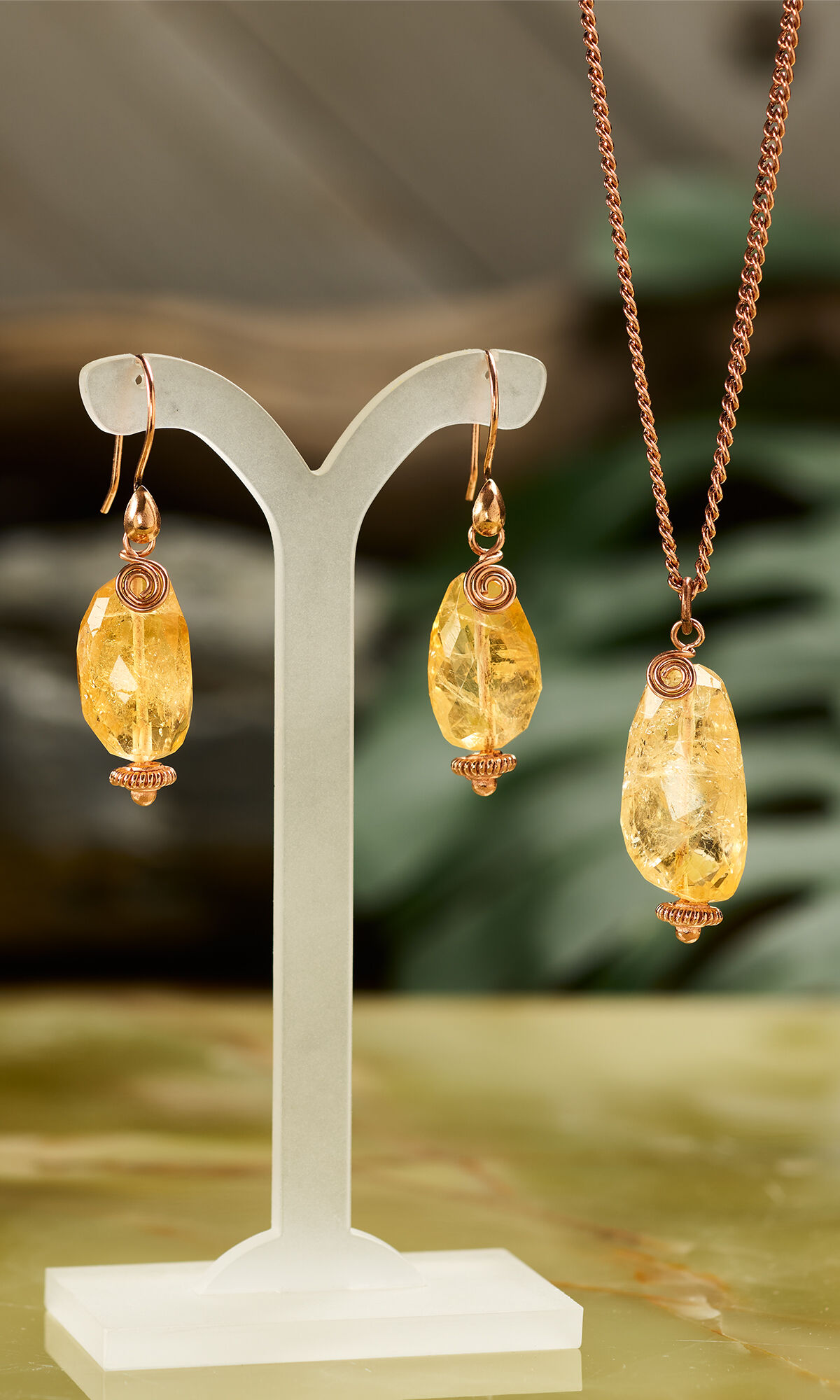 Design Idea R G 3 G Stylized Shot Featuring the Citrine necklace and earrings on display