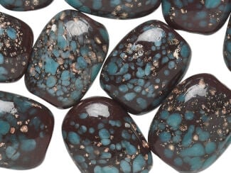 Dark blue lampworked glass oval beads with light blue and copper spatters