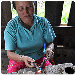 woman torching metal