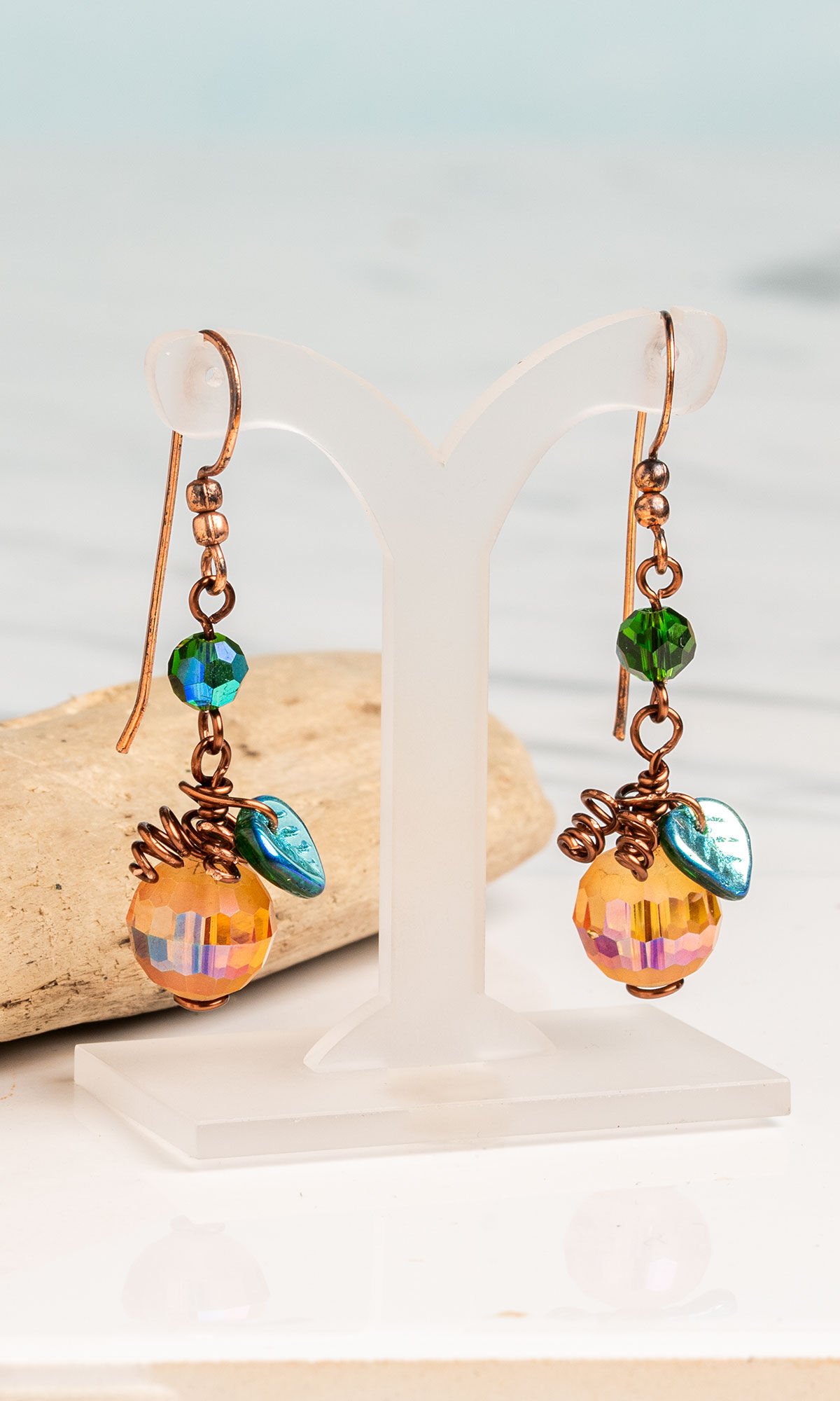 Earrings hanging from plastic display 