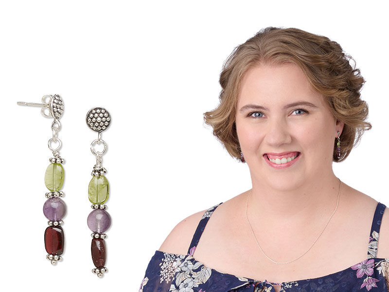 Model wearing a earrings made with beads on a head pin