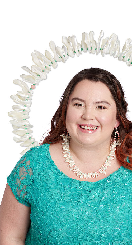 Model wearing a necklace made with shell beads