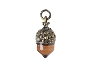 Acorn charm has a warm-toned pewter top and light brown glass bottom.