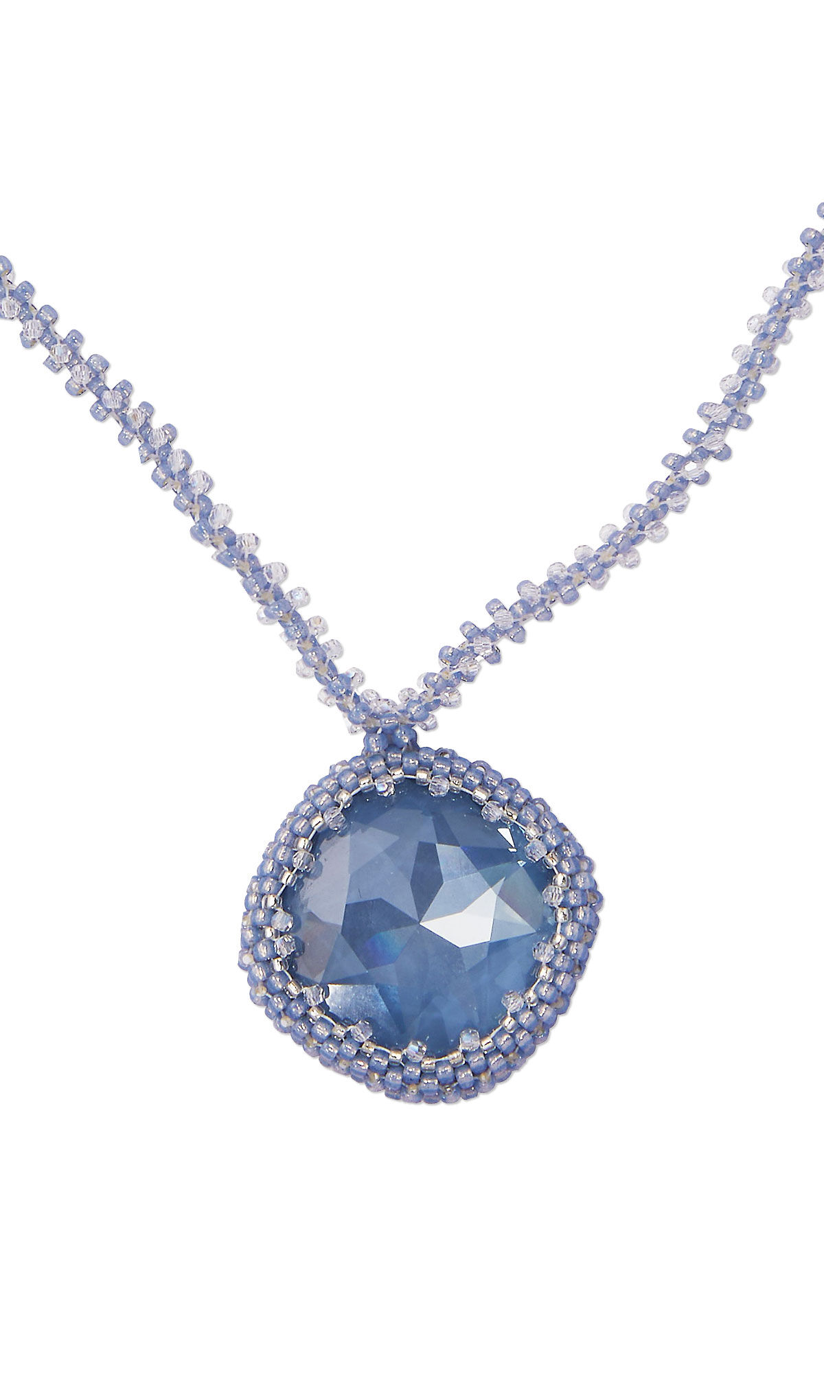 blue crystal fancy stone in a seed beaded pendant setting