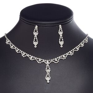 Necklace and earring set, glass rhinestone / plastic / imitation rhodium-plated brass / steel, clear, 1-1/2 inch dangle with cupchain and teardrop, 15" to 16" necklace with 3-inch extender chain and lobster claw clasp, 38mm earrings with post. Sold per set.