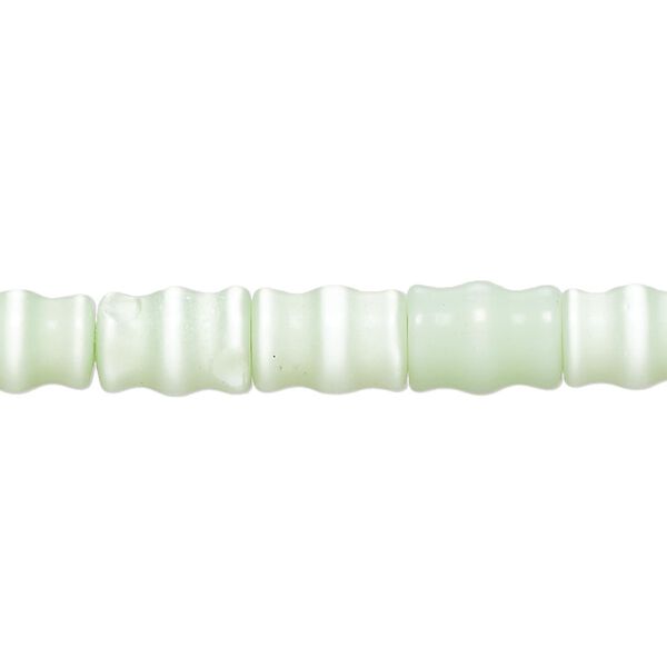 Bead, cat's eye glass (fiber optic glass ), mint green, 10x6mm-10x8mm carved tube. Sold per 14-inch strand, approximately 35 beads. image number 0