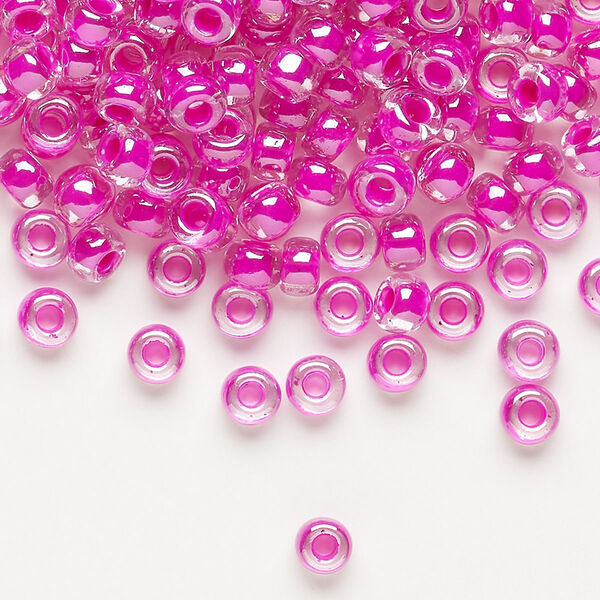 Seed bead, Miyuki, glass, pkg/25g, #6 rocaille, translucent fuchsia-lined luster crystal clear (RR-209). image number 0