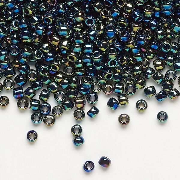Seed bead, Dyna-Mites™, glass, transparent rainbow multi-iris, #8 round. Sold per 40-gram pkg. image number 0