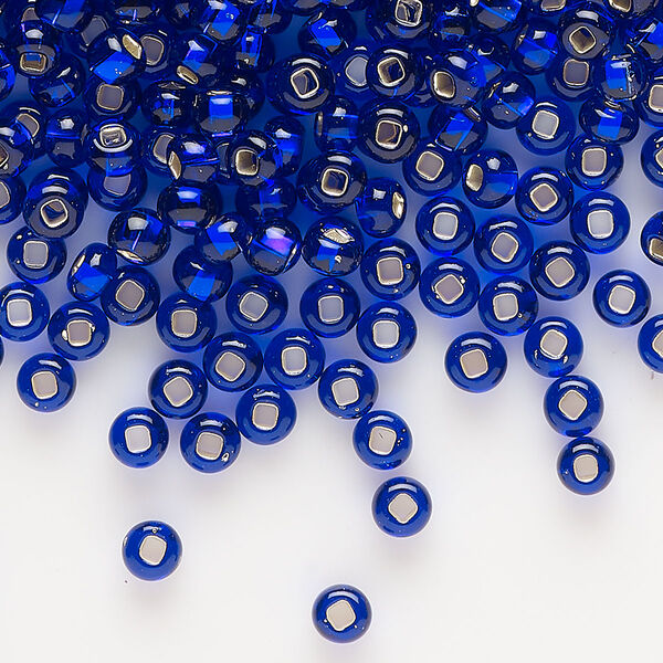 Seed bead, Preciosa Ornela, glass, transparent silver-lined blue, #6 rocaille. Sold per 500-gram pkg. image number 0