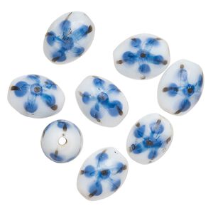 Bead, lampworked glass, opaque white / black / blue, 14x11mm-13x10mm oval with painted flower design. Sold per pkg of 8.