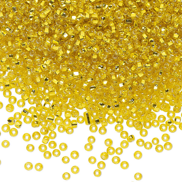 Seed bead, Preciosa Ornela Czech glass, pkg/50g, #11 rocaille, transparent silver-lined yellow amber, (87010). image number 0