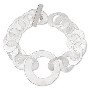 Bracelet, silver-plated copper, 22x15mm interlocking brushed oval with round cutout and 36mm brushed open round, 7 inches with toggle clasp. Sold individually.