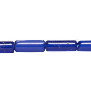 Bead, cat's eye glass (fiber optic glass), cobalt blue, 16x6mm-17x7mm round tube. Sold per 14-inch strand, approximately 25 beads.