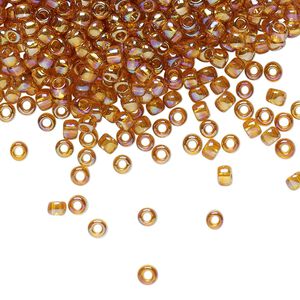 Seed bead, TOHO BEADS®, glass, pkg/250g, #8 round, translucent rainbow topaz (TR-08-162C).