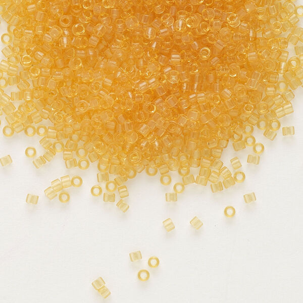 Seed bead, Delica®, glass, pkg/250g, #11 round, transparent light topaz (DB-0702). image number 0