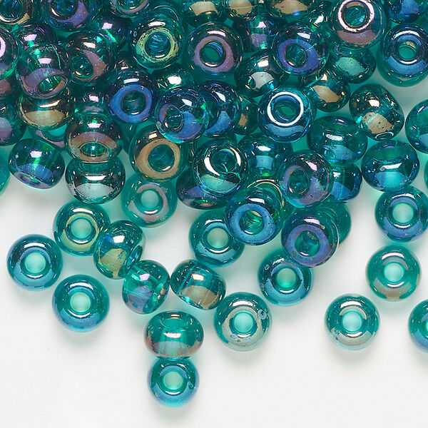 Seed bead, Preciosa Ornela, glass, translucent rainbow teal, #2 rocaille. Sold per 50-gram pkg. image number 0
