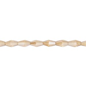 Bead, glass, crystal golden shadow, 6.5x3.5mm long bicone. Sold per 15-1/2 to 16-inch strand.