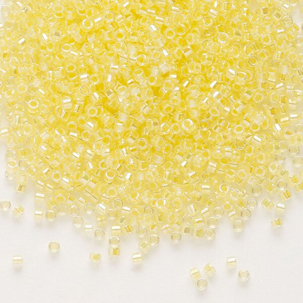 Seed bead, Delica®, glass, pkg/50g, #11 round, translucent light yellow-lined rainbow crystal clear (DB-0053). image number 0