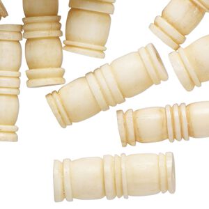 Bead, bone (bleached), antique white, 25x7mm-25x10mm tapered capsule, Mohs hardness 2-1/2. Sold per pkg of 20.