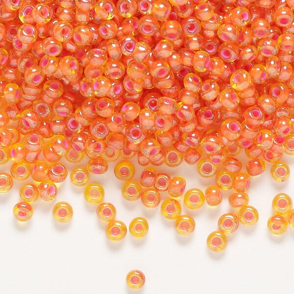 Seed bead, Preciosa Ornela, glass, translucent pink-lined luster yellow amber, #8 rocaille. Sold per 500-gram pkg. image number 0