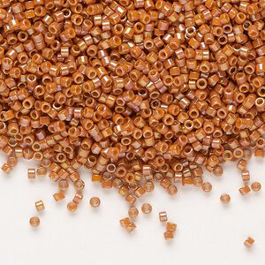 Seed bead, Delica®, glass, pkg/7.5g, #11 round, opaque rainbow glazed persimmon (DB-2274).