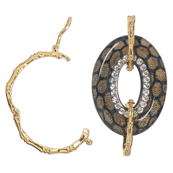 Focal, dichroic glass / Czech rhinestone / gold-finished brass, black / gold / clear, 40x30mm single-sided oval donut with spotted design and twister clasps. Sold individually. image number 0